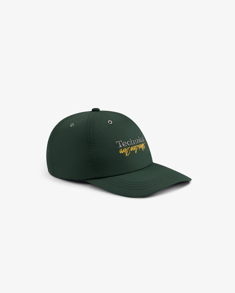 Dark green ALD / Technics Nylon Logo Hat with yellow script, shown on a white background.