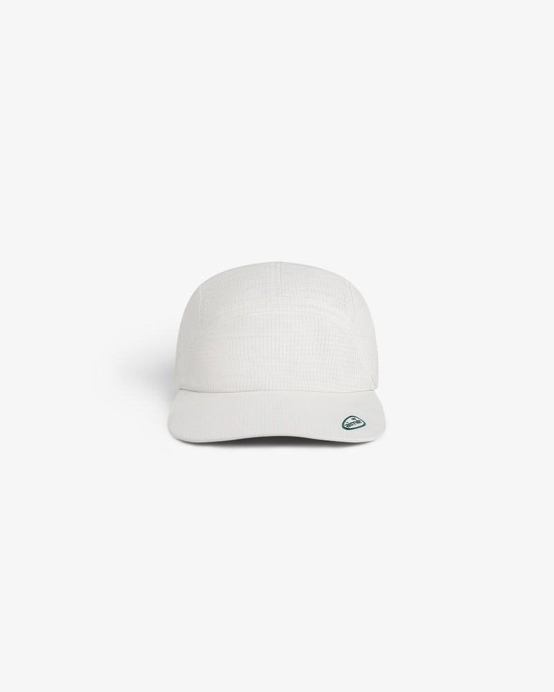 ALD Golf Performance Sport Hat in white with a small blue and white oval logo on the brim, shown on a white background.
