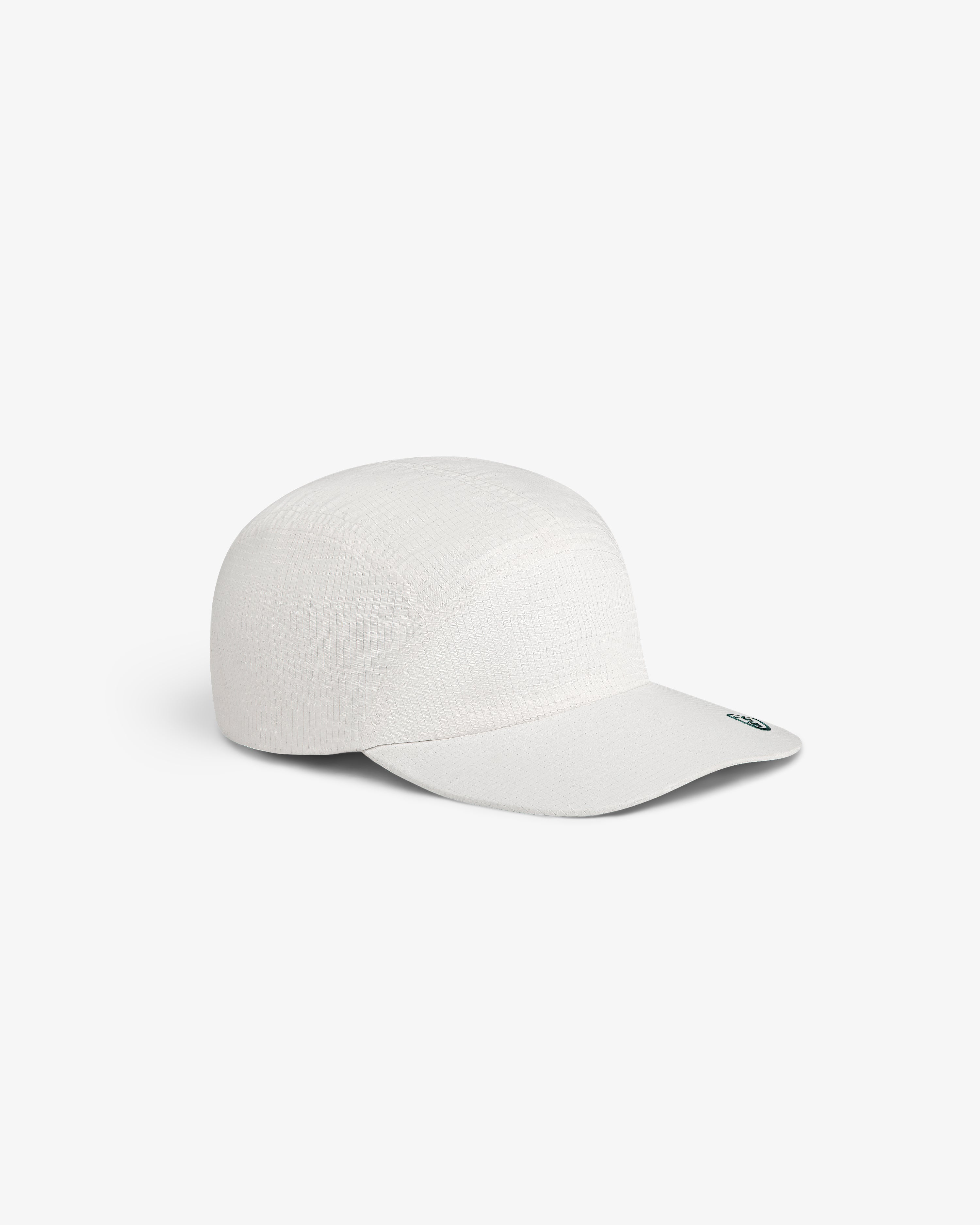 The ALD Golf Performance Sport Hat, a plain white cap with a curved brim, is shown on a white background.