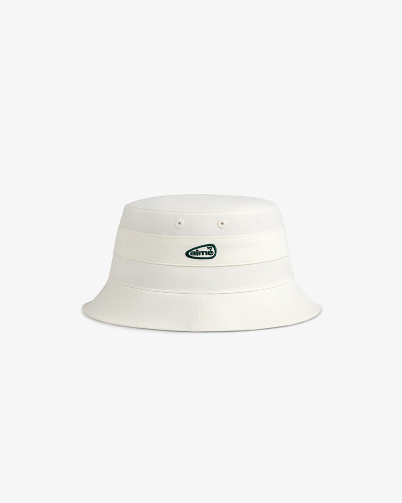 ALD Golf Bucket Hat in white with a small green and white oval logo on the front, shown on a plain background.