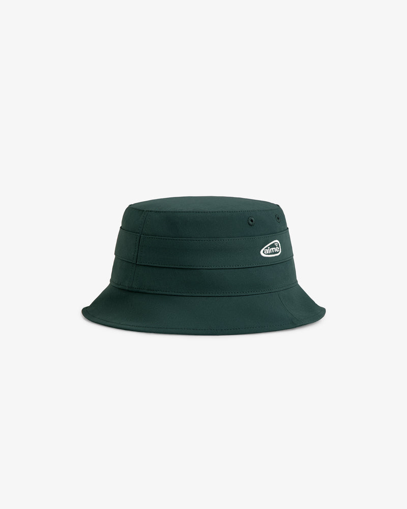 ALD Golf Bucket Hat in dark green with a subtle side logo patch, shown on a plain white background.