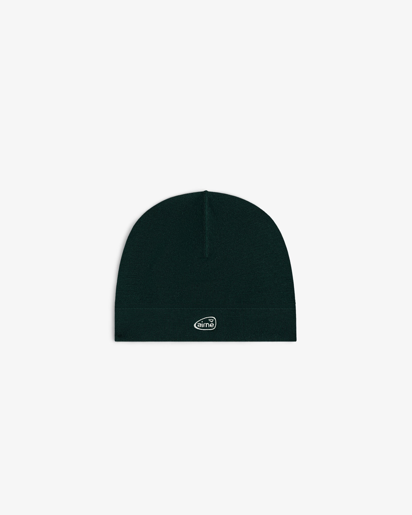 ALD Golf Skull Cap—black knit beanie with small white oval logo patch, shown on plain white background.