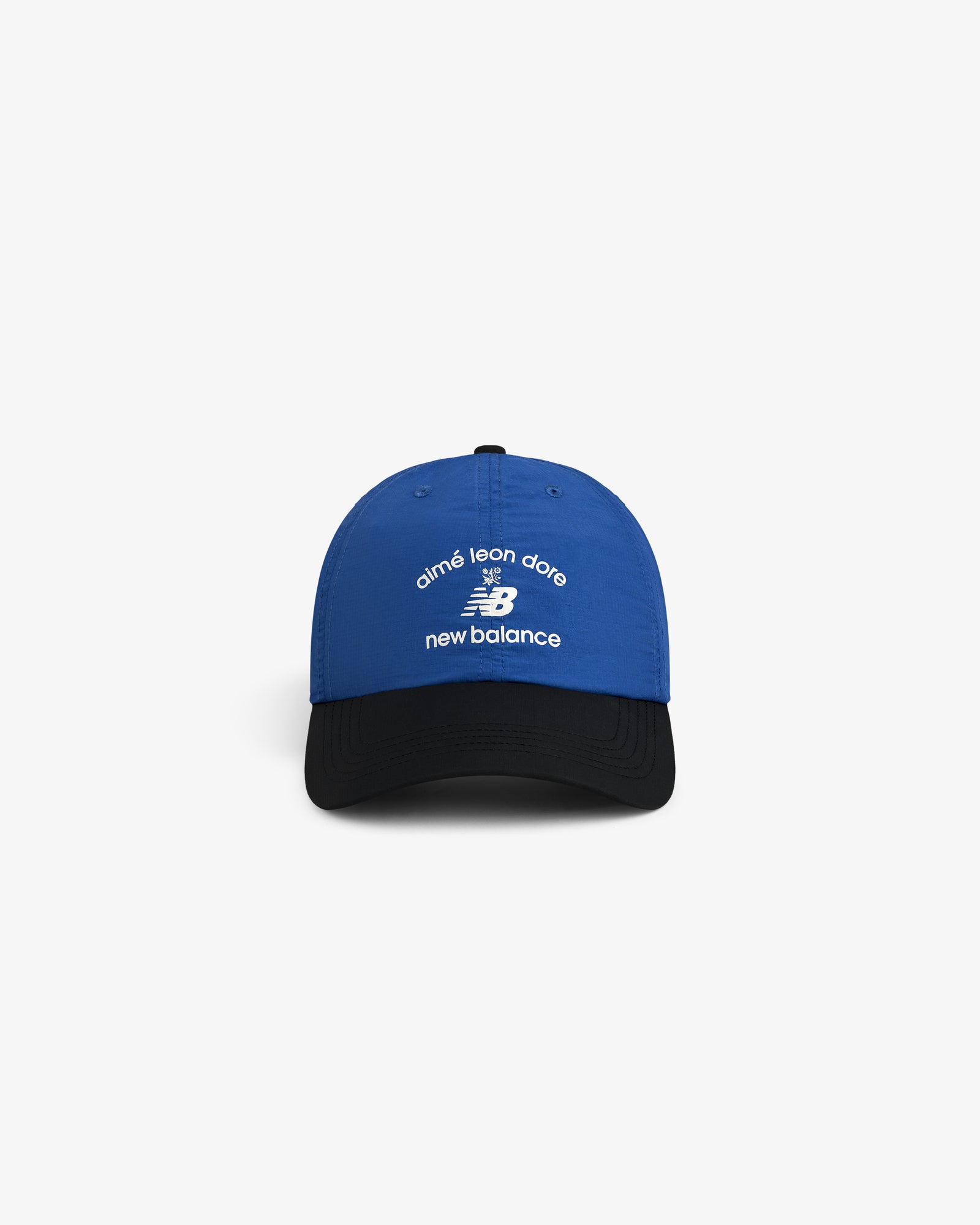 Blue and black ALD / New Balance Running Hat with white logos on the front.