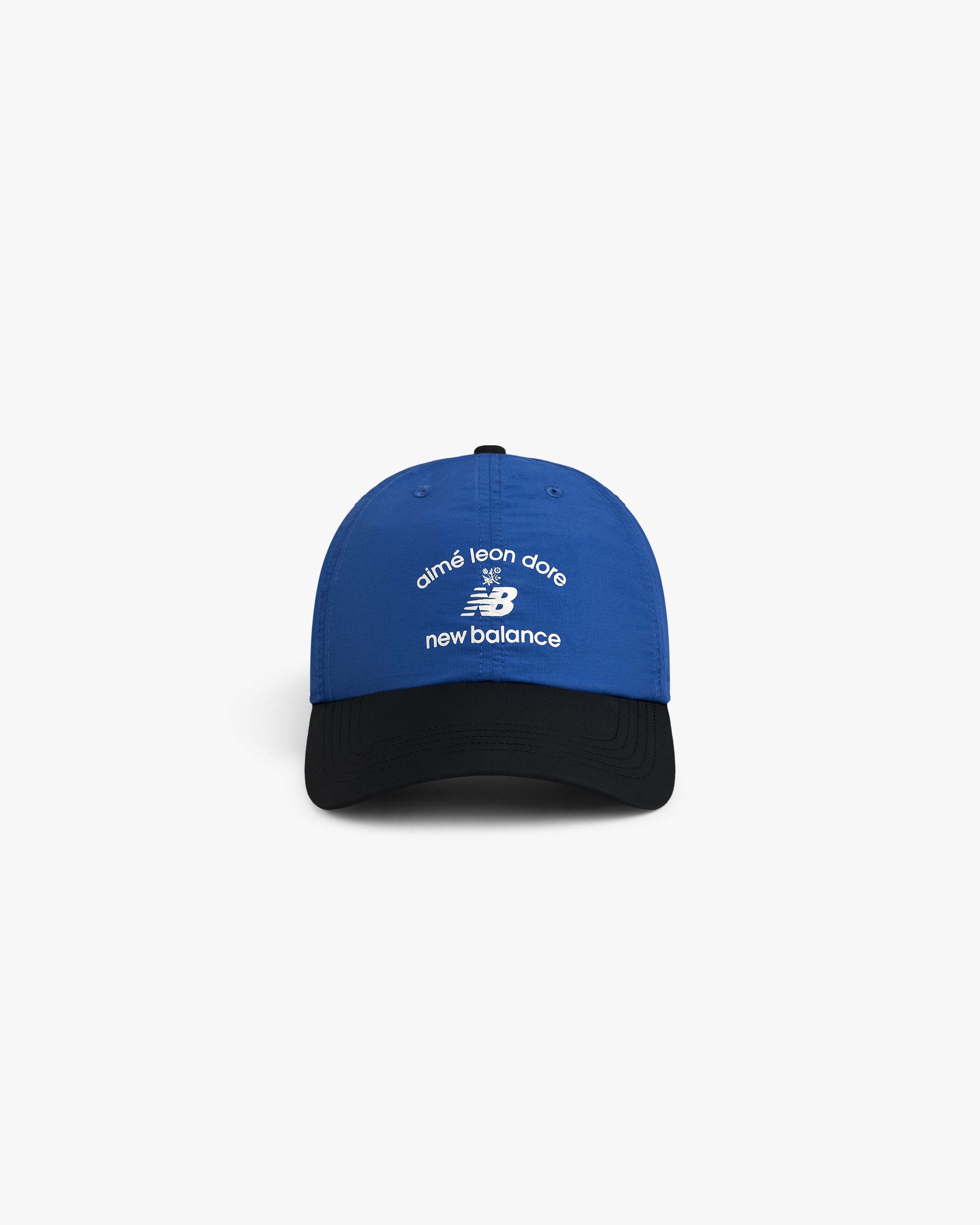 Blue and black ALD / New Balance Running Hat with white logos on the front.