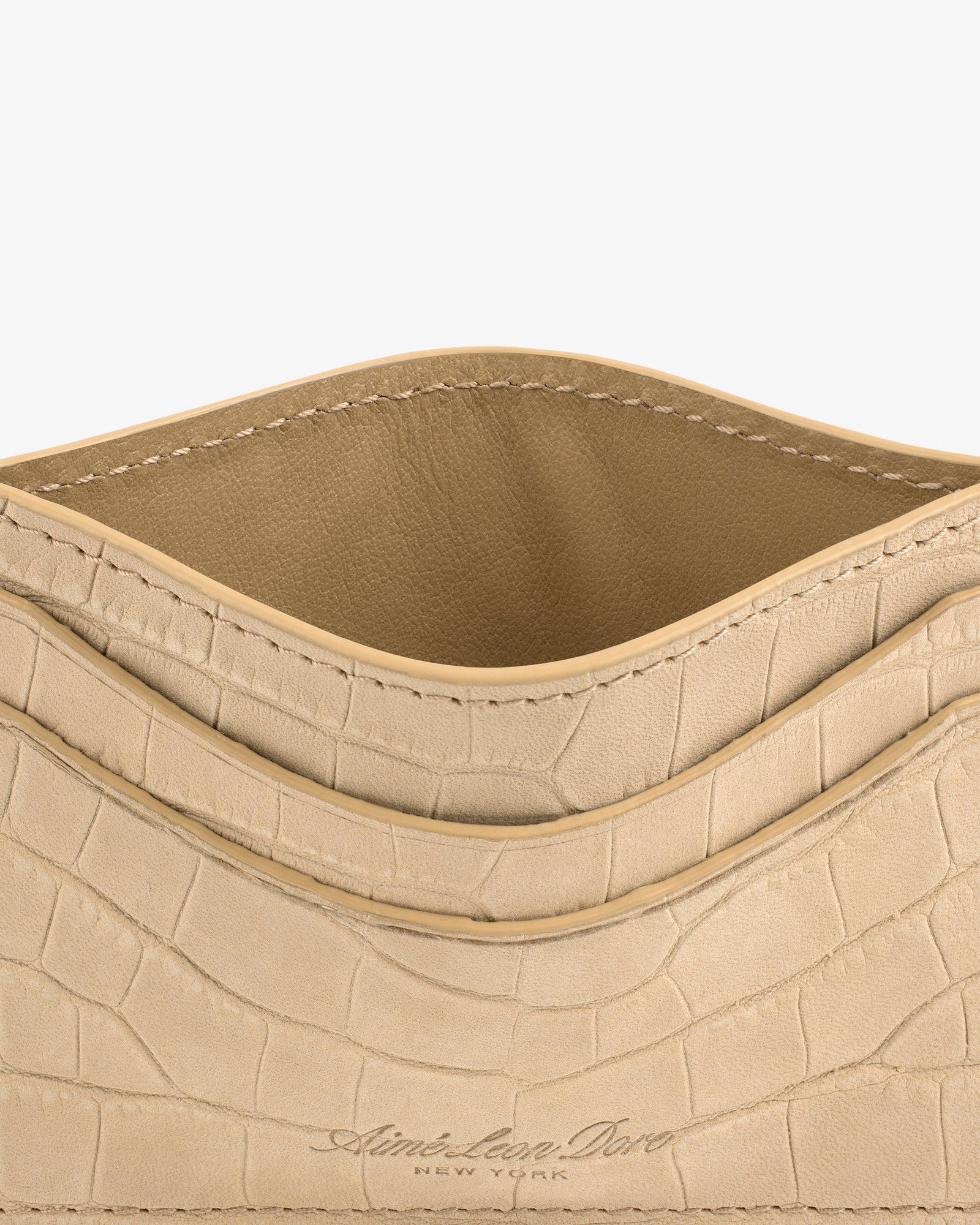 Croc-Embossed Nubuck Cardholder with open pocket and Aimé Leon Dore New York embossed at the bottom.