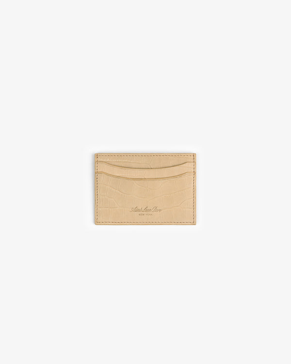 Beige Croc-Embossed Nubuck Cardholder with two slots and subtle detailing, centered on a white background.