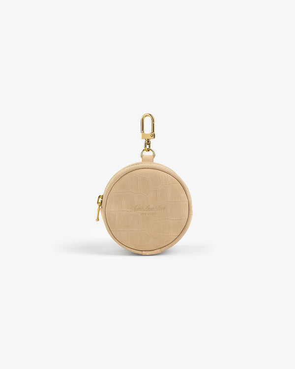 Croc-Embossed Nubuck Keychain Pouch in beige with gold zipper and clasp, shown on a white background.