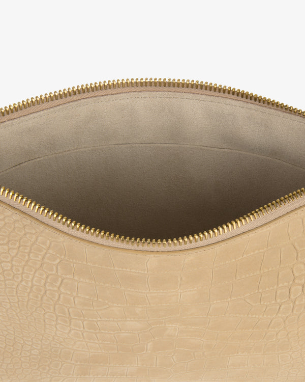 Small Croc-Embossed Nubuck Pouch in beige with gold zipper and soft, suede-like interior shown open.
