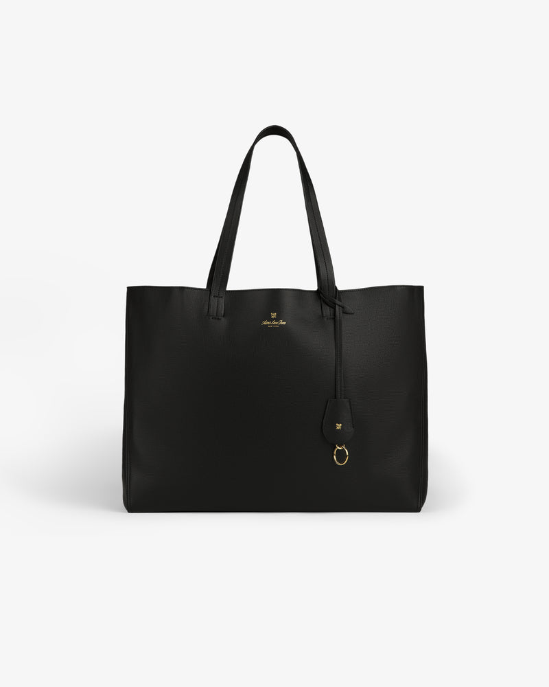 Full Grain Leather Tote Bag in black with two handles and a small tag, shown on a plain white background.
