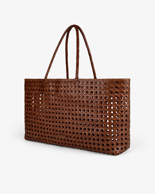 Woven Leather Tote Bag with double handles, brown leather, shown on a plain white background.