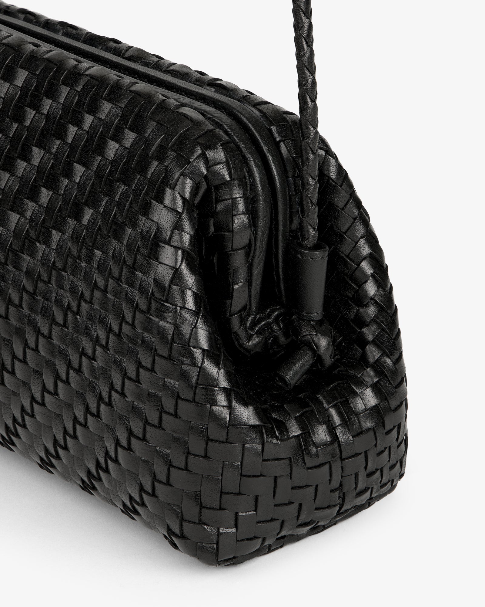 Close-up of the Woven Leather Shoulder Bag in black with a drawstring closure, set against a plain white background.
