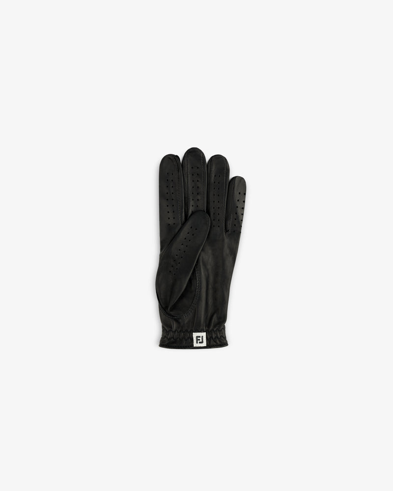 The ALD / FootJoy StaSof Heritage Glove (Left) is black leather with vents and an FJ logo on the wrist.