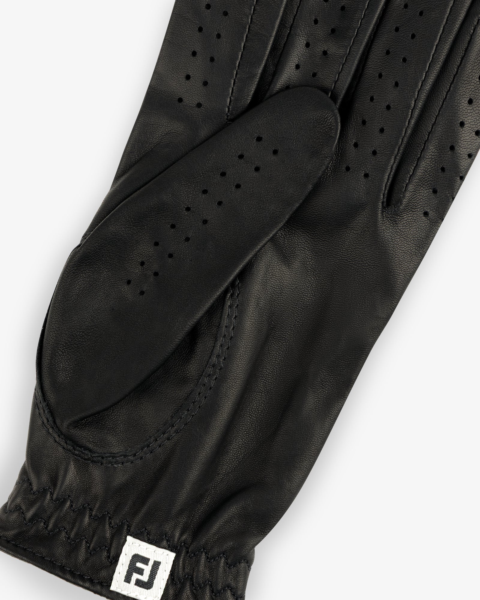 ALD / FootJoy StaSof Heritage Glove (Left) in black leather with perforations and FJ tag near the elastic wrist.
