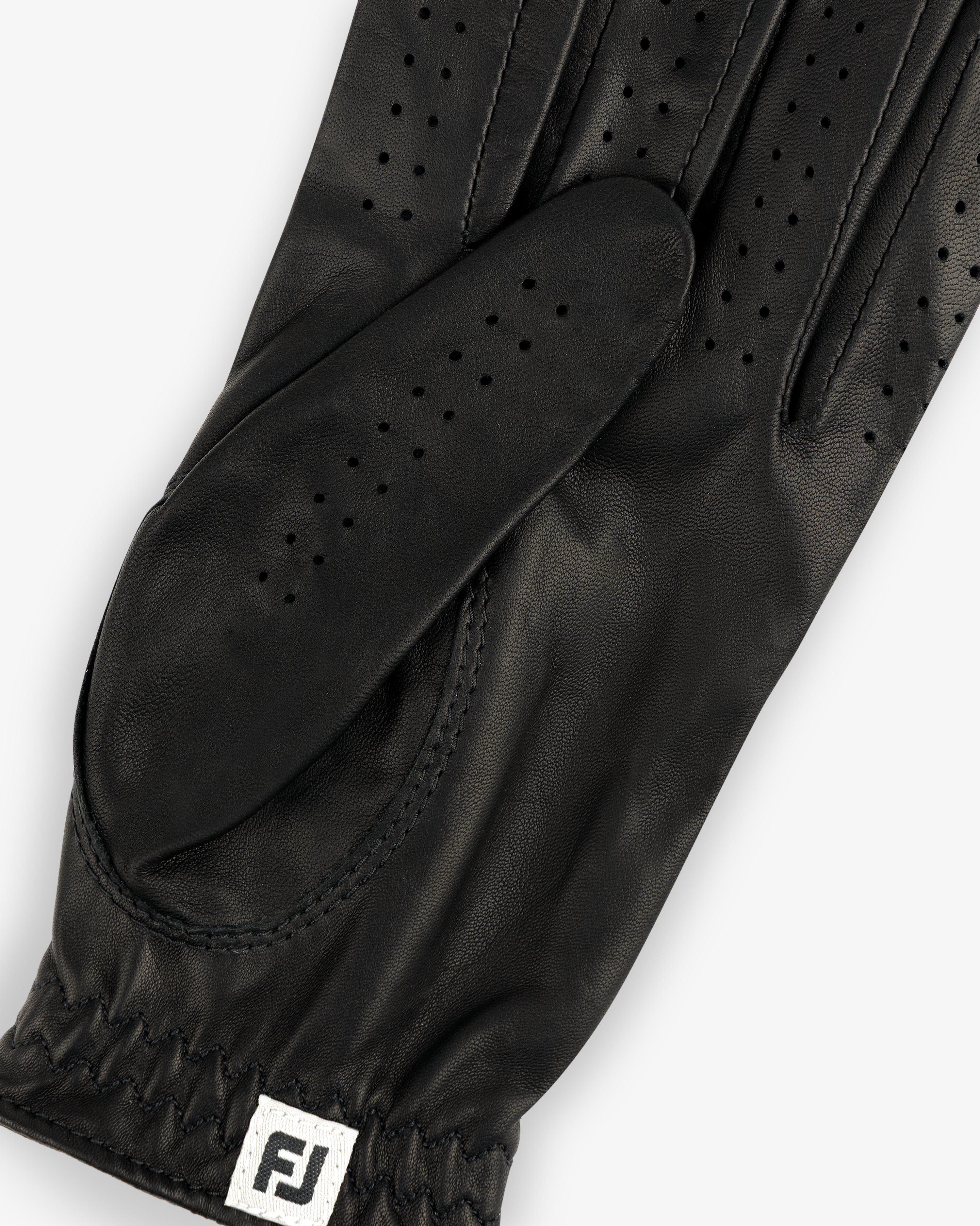 ALD / FootJoy StaSof Heritage Glove (Left) in black leather with perforations and FJ tag near the elastic wrist.