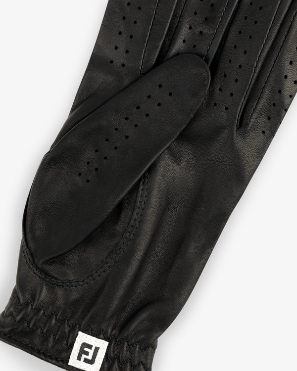 ALD / FootJoy StaSof Heritage Glove (Left) in black leather with perforations and FJ tag near the elastic wrist.