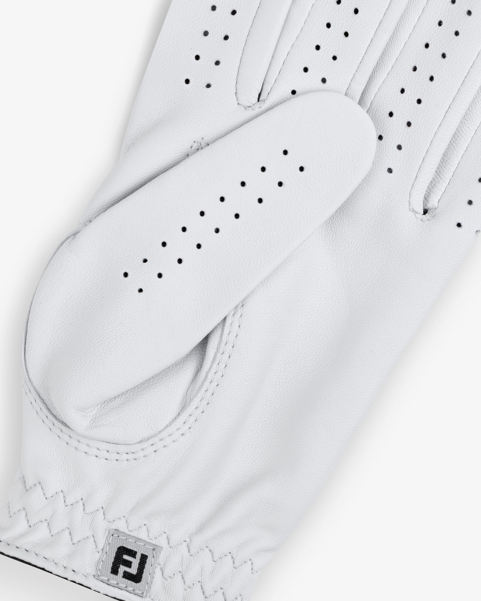 Close-up of the ALD / FootJoy StaSof Heritage Glove (Left) with perforations and FJ logo on the wrist.