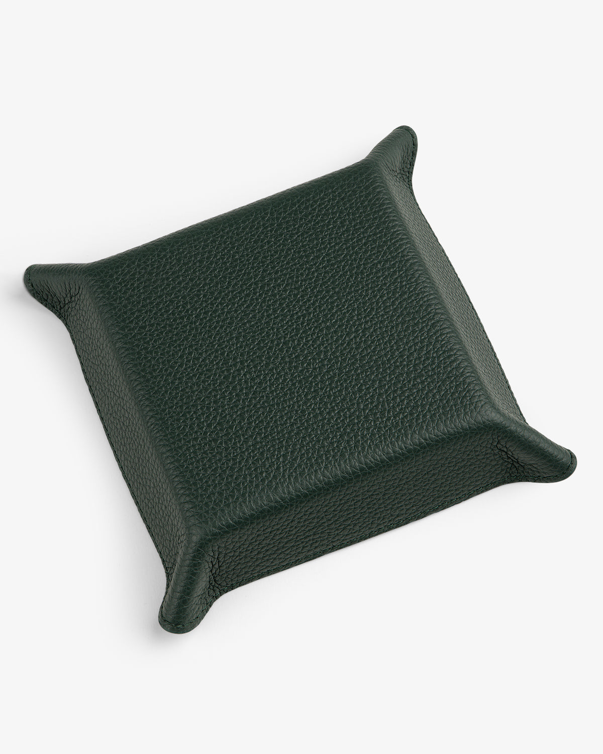 A square, dark green Leather Catchall tray with raised, pointed corners on a white background.