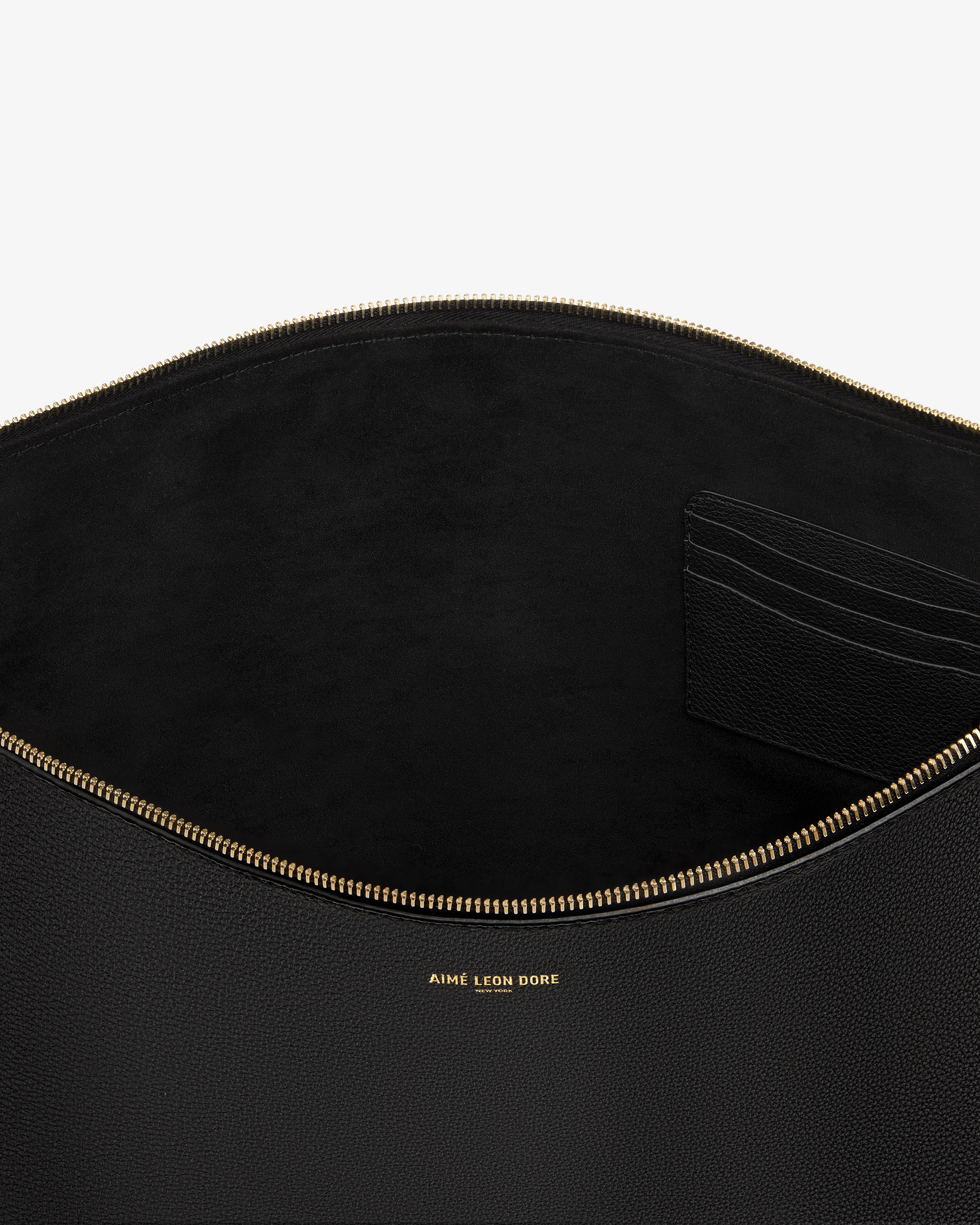 Large Leather Pouch in black leather with gold zipper, card slots, and gold AIME LEON DORE logo text inside.