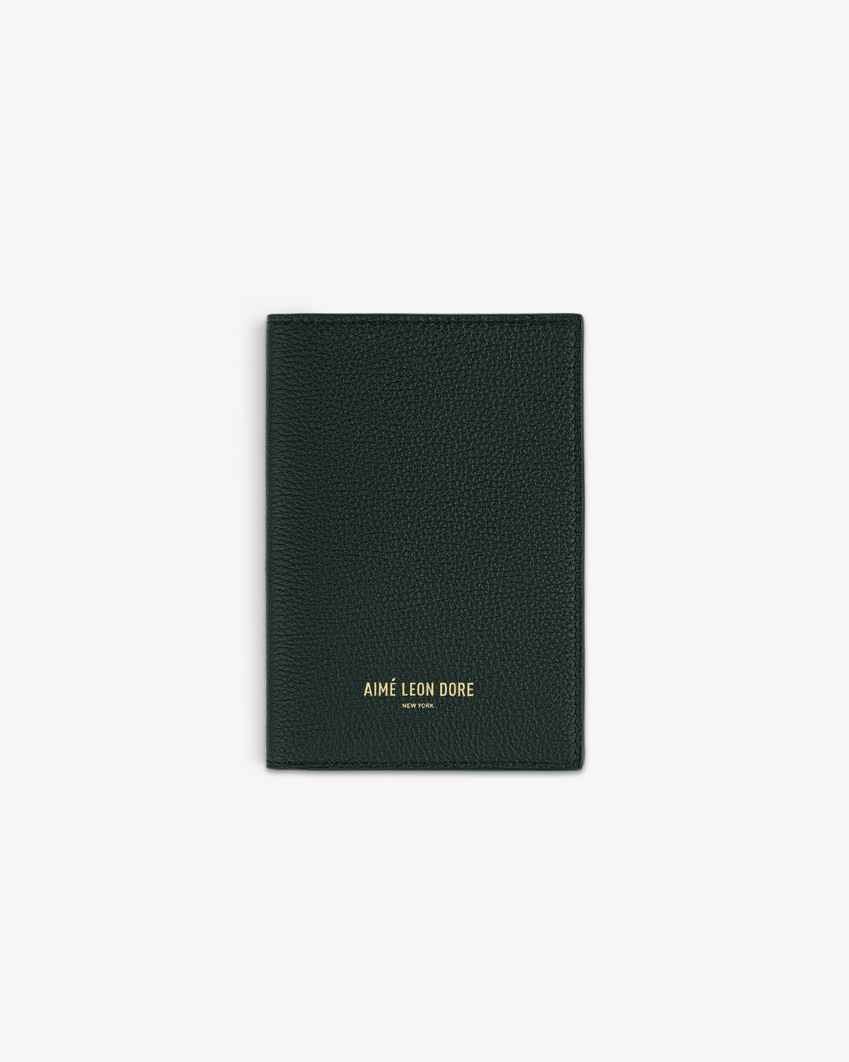 Dark green textured Leather Passport Holder with AIMÉ LEON DORE gold lettering on the front.