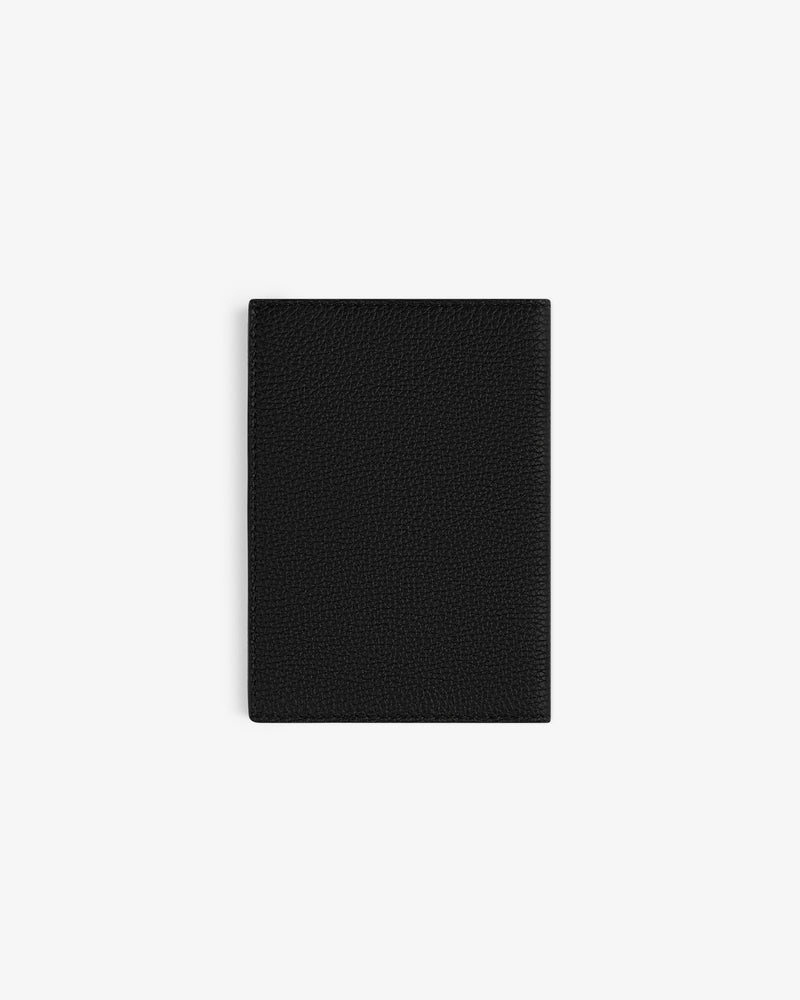A closed Leather Passport Holder in black leather shown against a plain white background.
