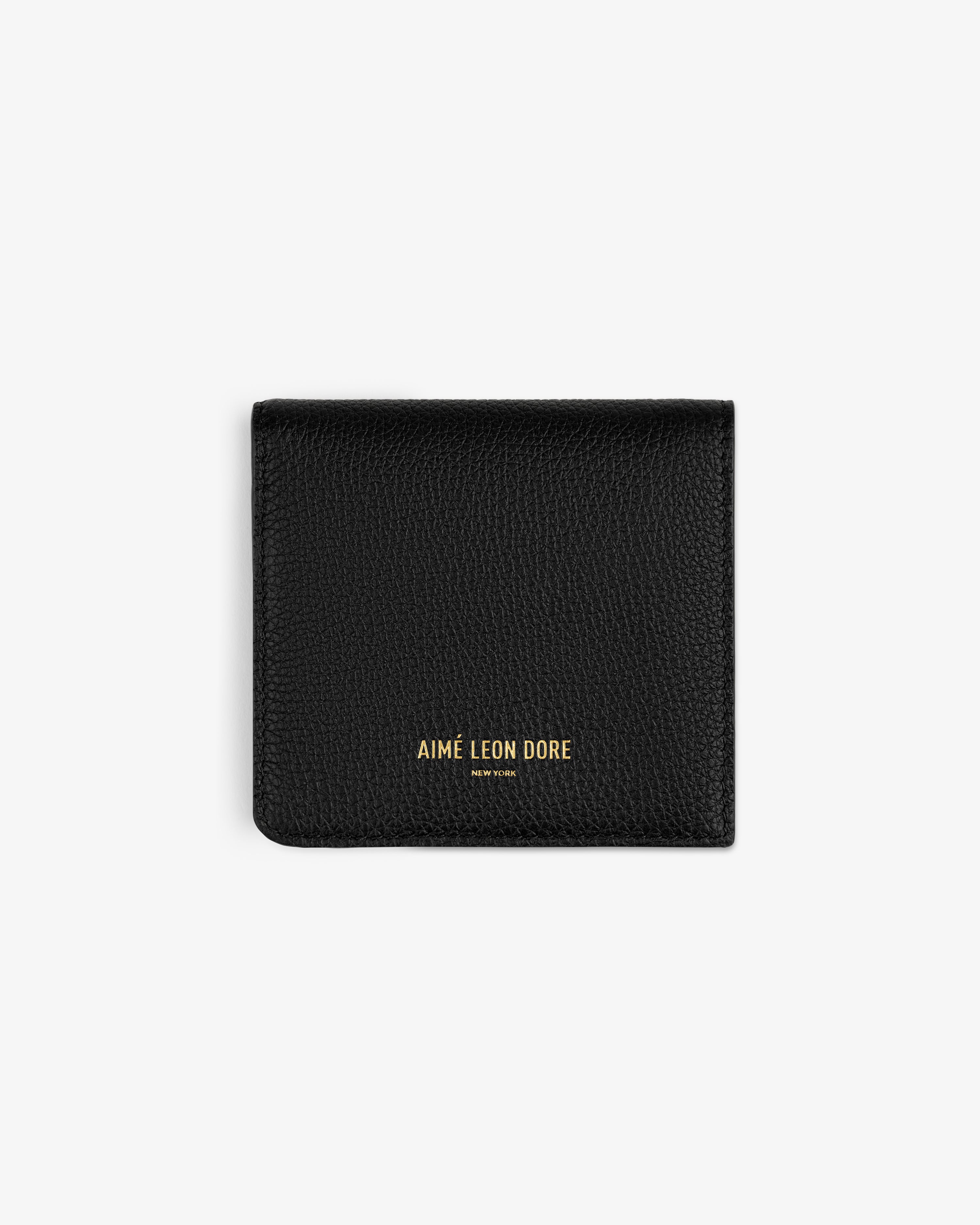 Black Leather Bi-Fold Wallet with gold "AIMÉ LEON DORE" logo embossed on the front, shown on a white background.