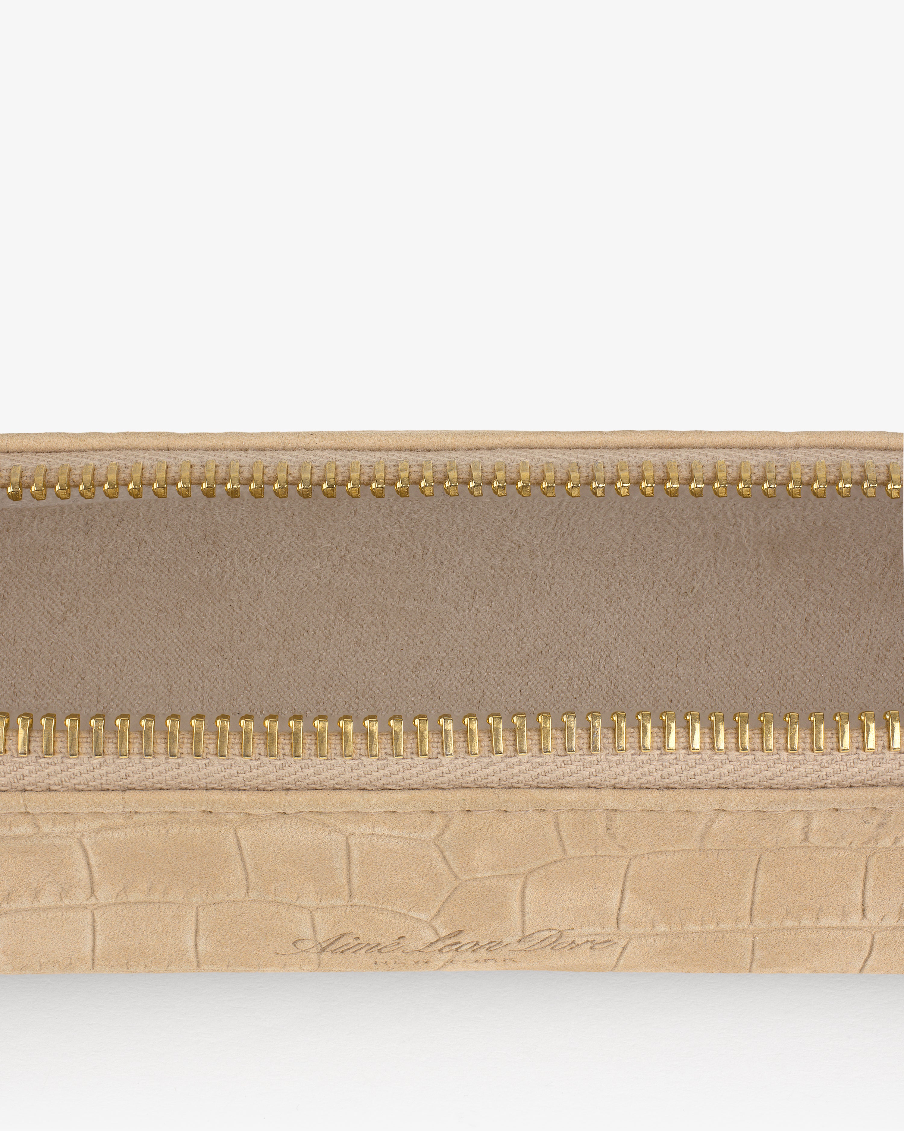 Close-up of an open Croc-Embossed Nubuck Pencil Case with a gold zipper and fabric lining.