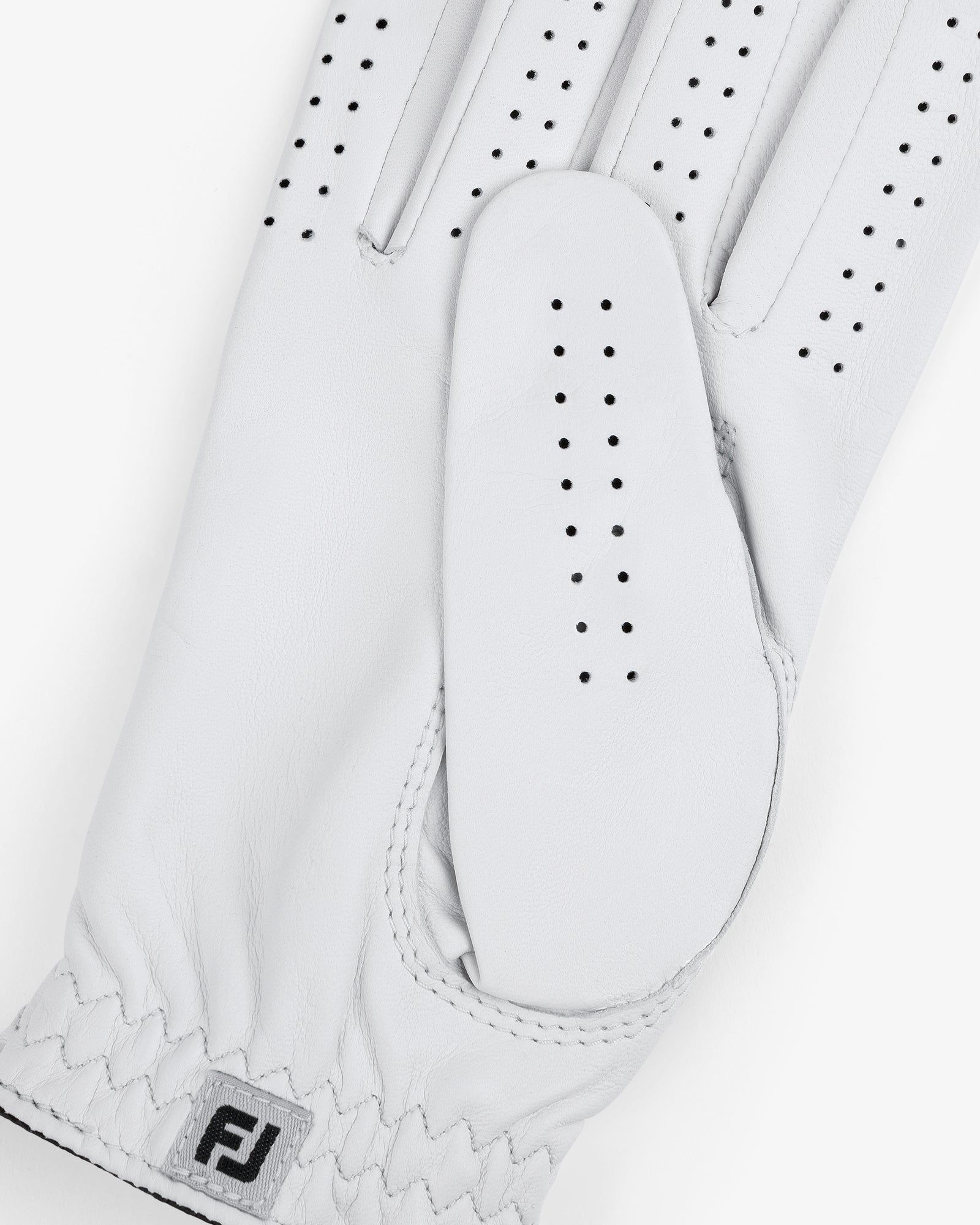 The ALD / FootJoy StaSof Heritage Glove (Right) is a white leather glove with perforations and an FJ cuff logo.
