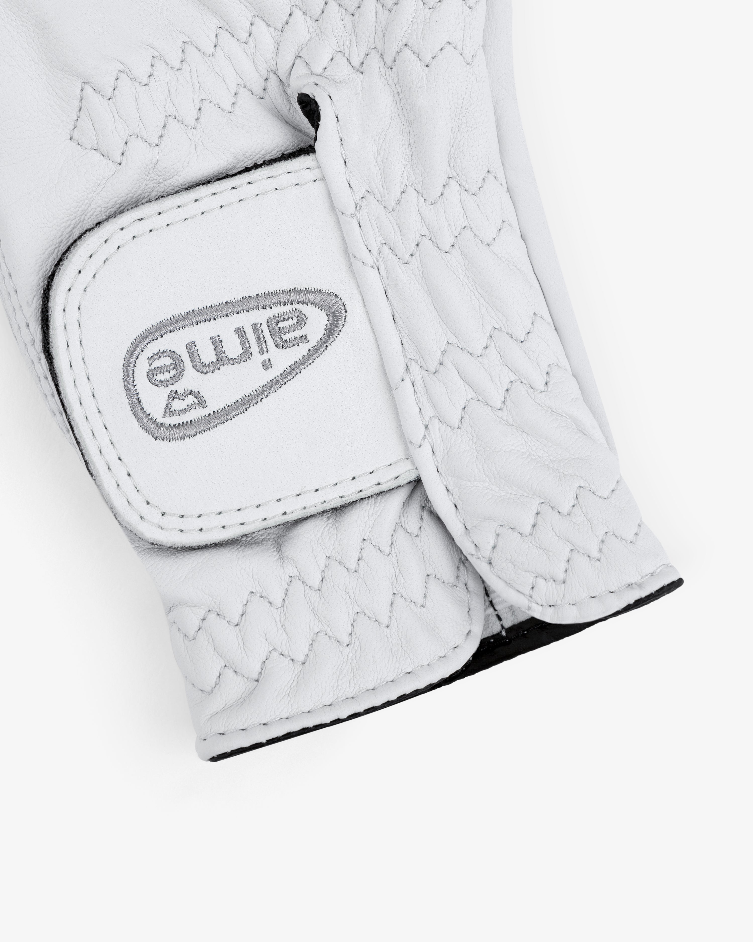 Close-up of the ALD / FootJoy StaSof Heritage Glove (Right) with "Aime" stitched upside down on the strap.