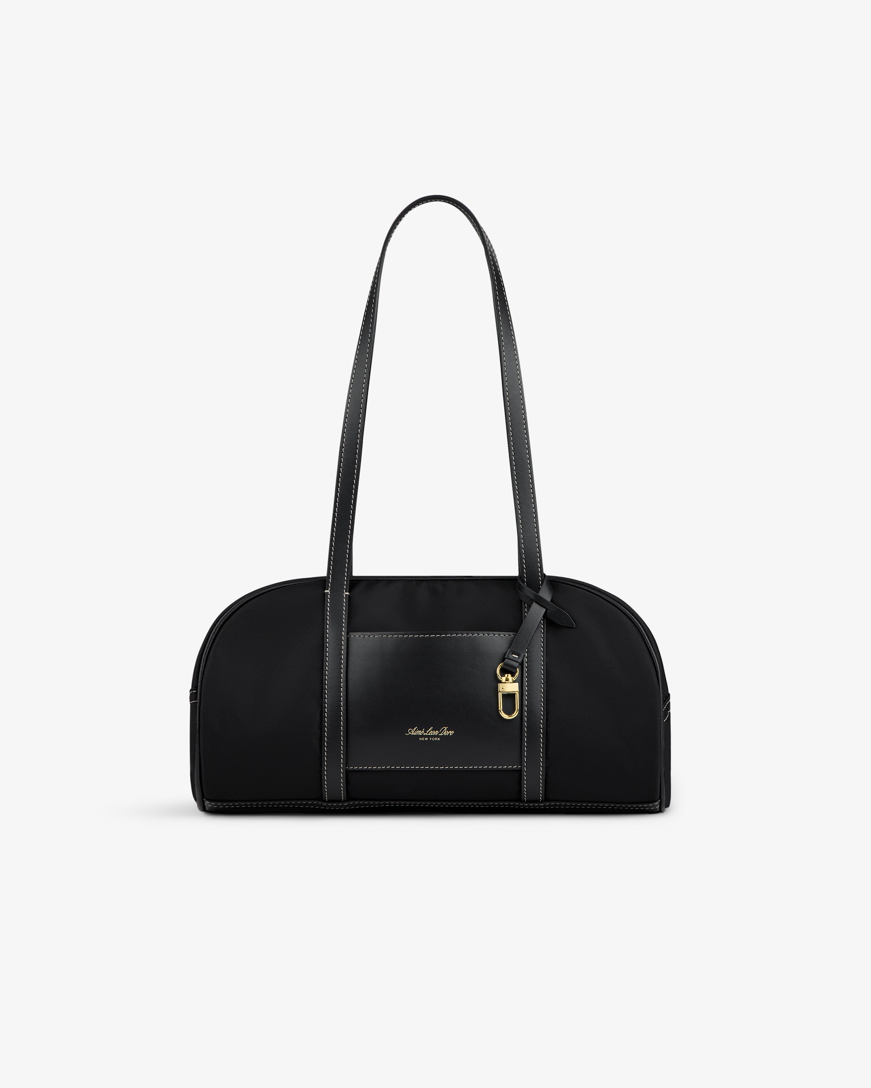Mini Duffle Shoulder Bag in black with long straps, gold-tone hardware, and small front logo on white background.
