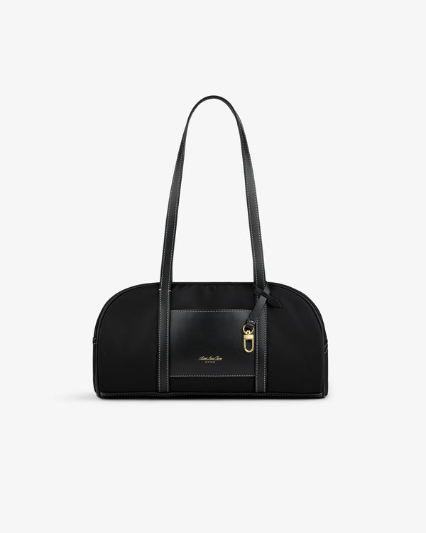 Mini Duffle Shoulder Bag in black with long straps, gold-tone hardware, and small front logo on white background.