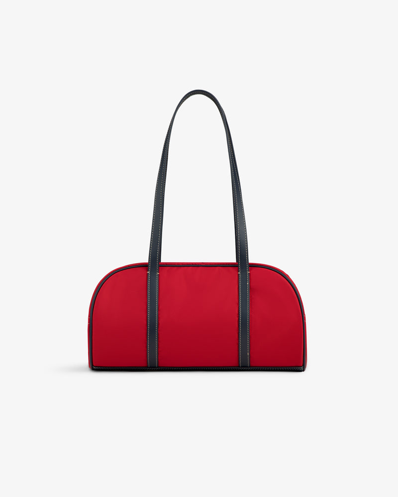 Mini Duffle Shoulder Bag in red with long black straps, displayed on a plain white background.