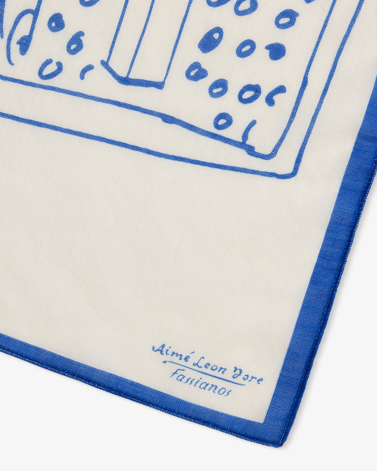 Fassianos Wool Silk Bandana: white with blue abstract design, blue border, and Aimé Leon Dore x Fassianos in one corner.