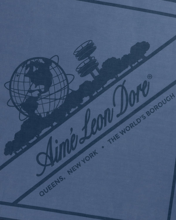 Sun Faded Unisphere Bandana with Ainé Leon Dore globe logo, trees, and "Queens, New York - The World's Borough" text.