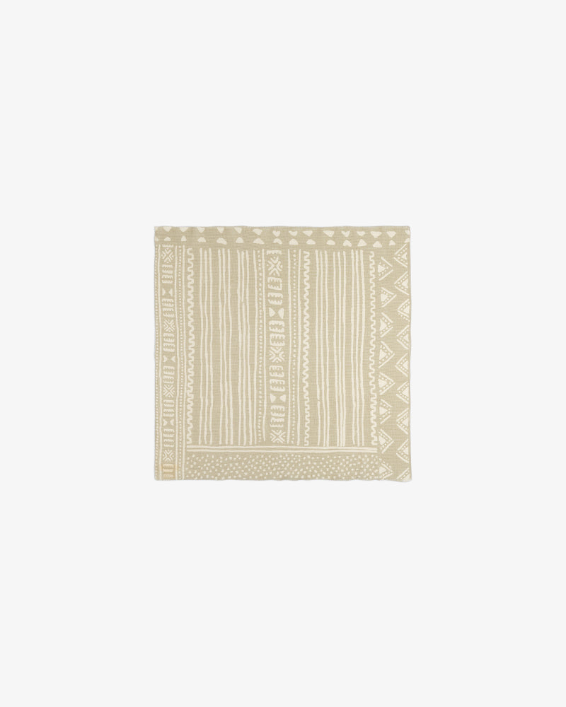 Mesh Tapestry Bandana in beige with geometric and striped white patterns, shown on a plain white background.
