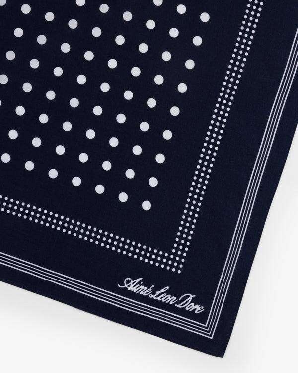 Polka Dot Bandana in navy blue with white dots and Aimé Leon Dore script in the corner.