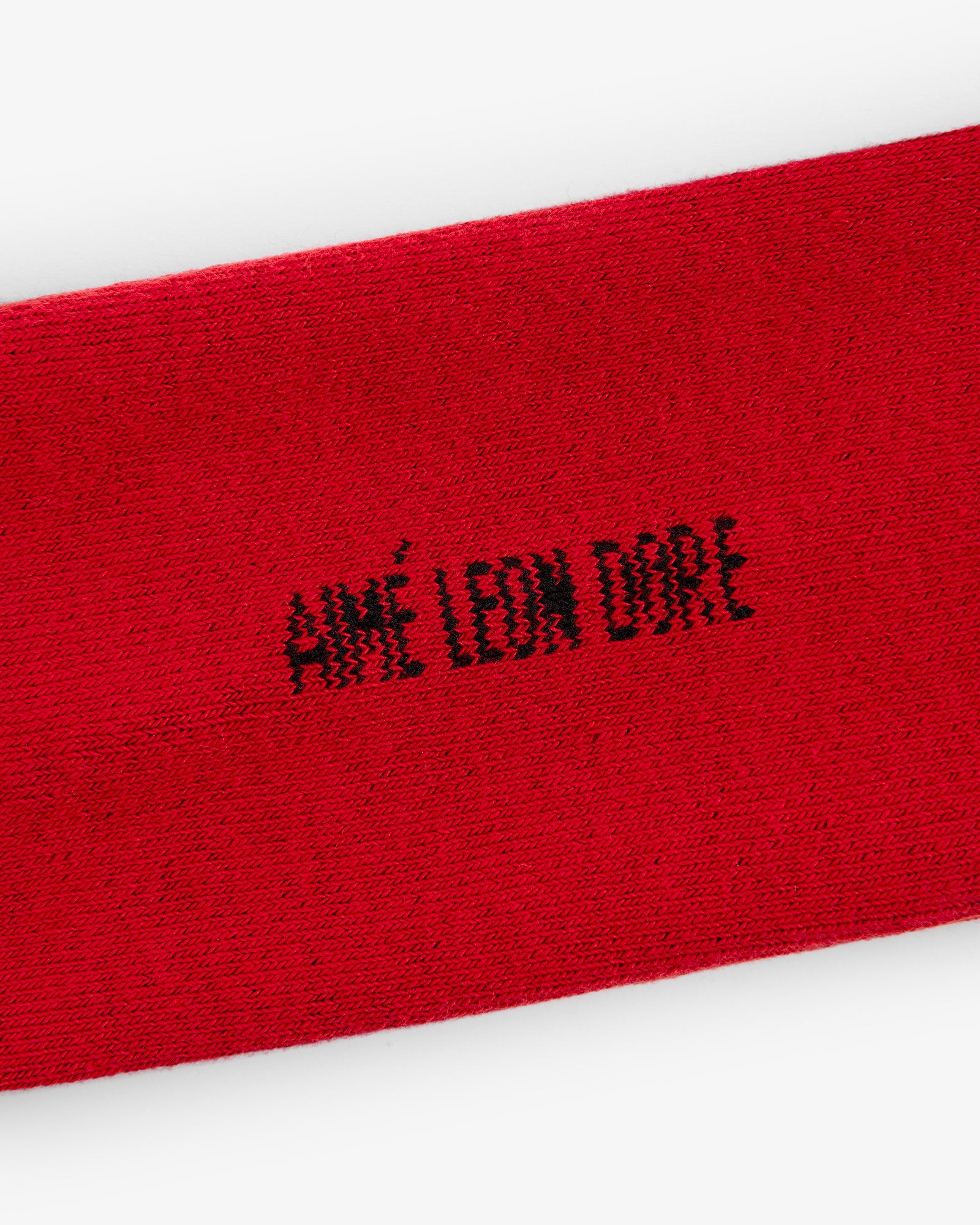 Red Crew Sock 3-Pack with AIMÉ LEON DORE in black pixelated text at the center.