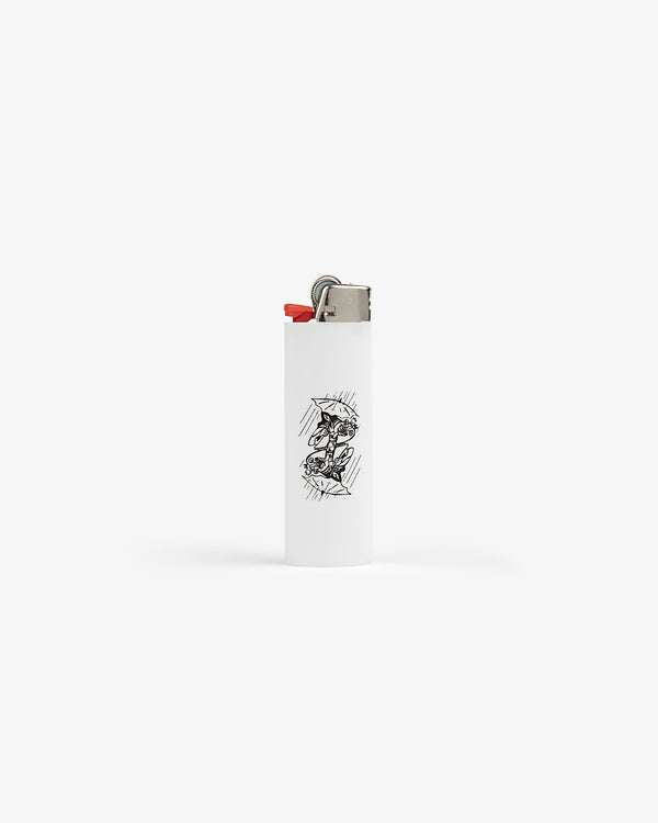 Caricature Lighter with a black abstract sketch on the front, shown against a plain white background.
