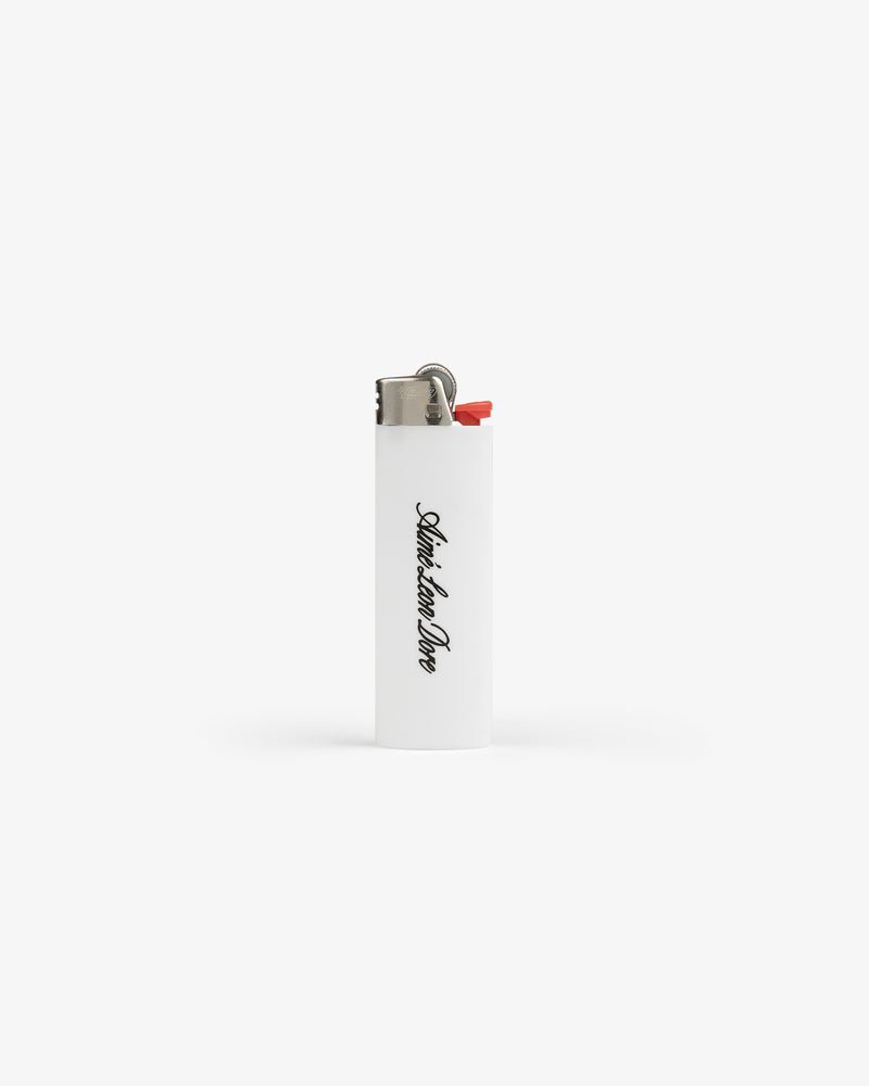 A white Caricature Lighter with a red ignition button and AnotherSunrise in black script on the front.