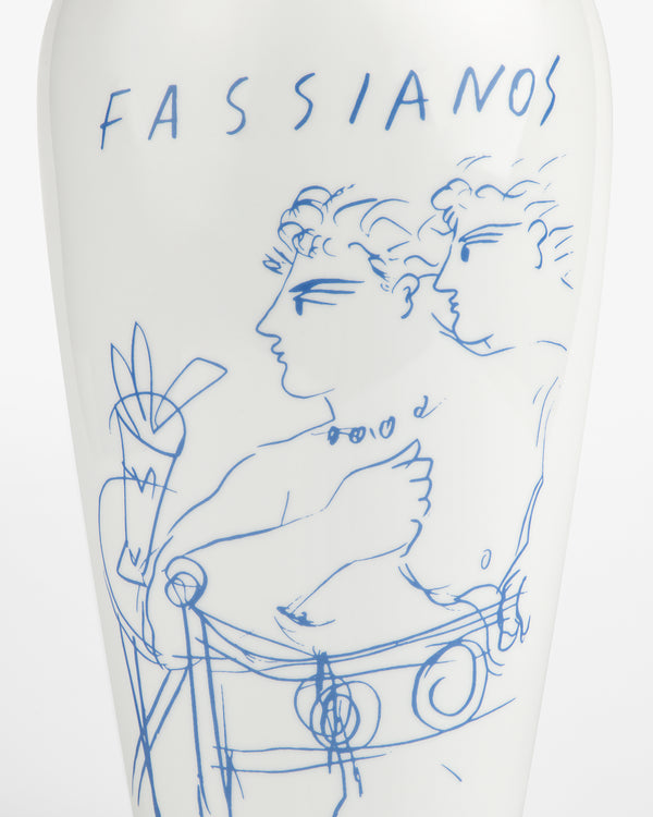 The Fassianos "Rendez-Vouz" Vase is white with blue line art of two figures and "FASSIANOS" at the top.