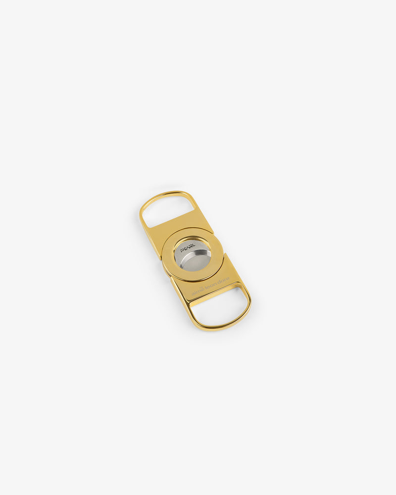 ALD Golf Cigar Cutter in gold and silver with double finger holes, displayed on a plain white background.