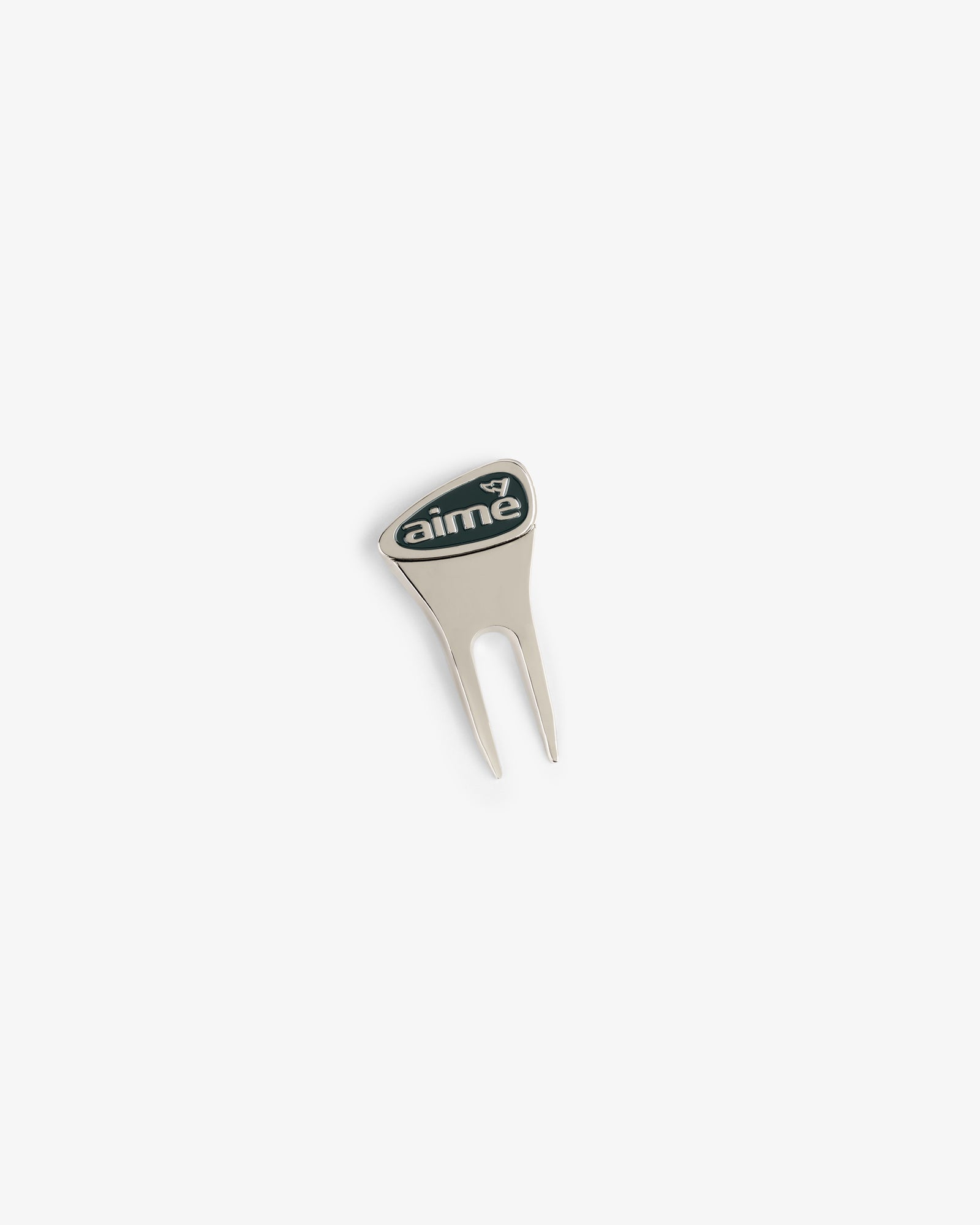 The ALD Golf Divot Tool is silver with a black aime logo on the handle, displayed on a white background.
