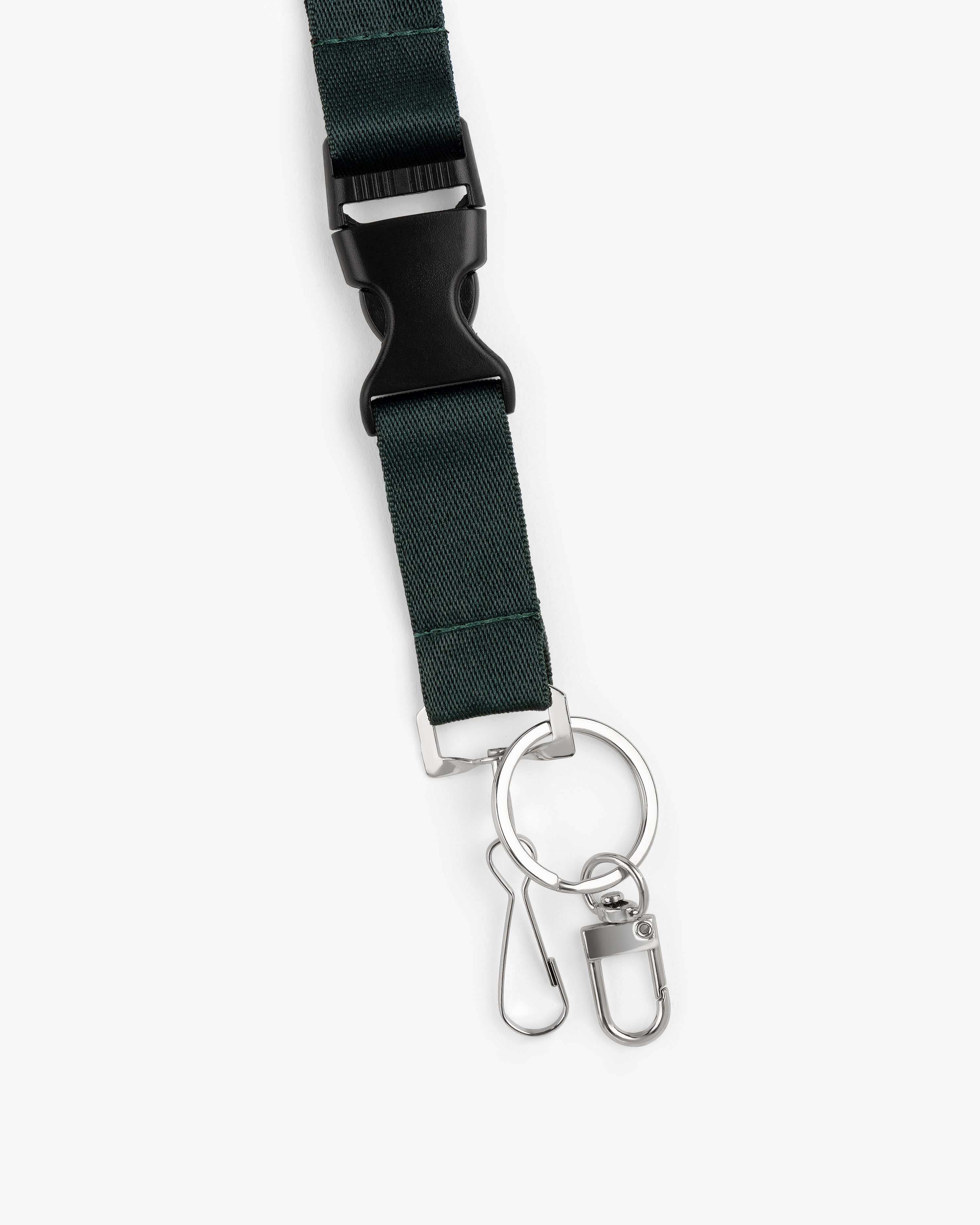 The ALD / Technics Lanyard is dark green with a black plastic buckle and silver key rings with clips attached.