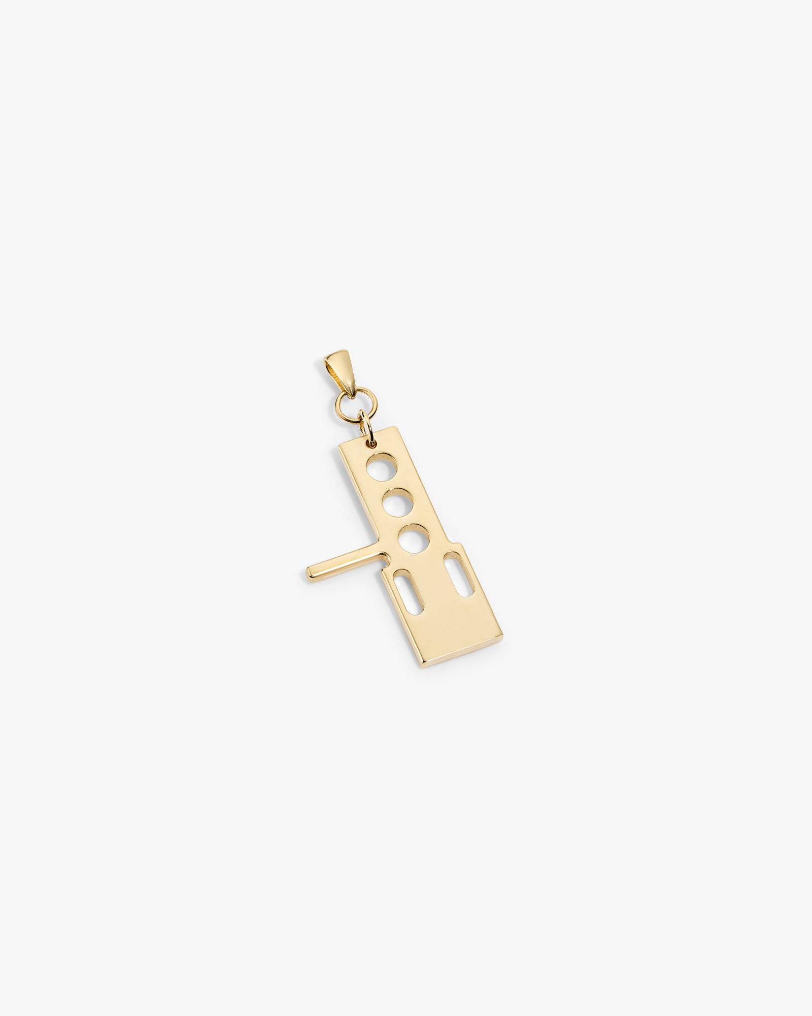 ALD / Technics 14Kt Gold Pendant shaped like a stylized gun with cutouts, shown on a white background.