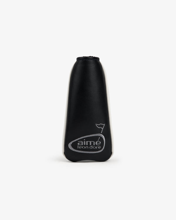 The ALD Golf Putter Cover features black leather with an aimé leon dore logo and flag graphic on a white background.