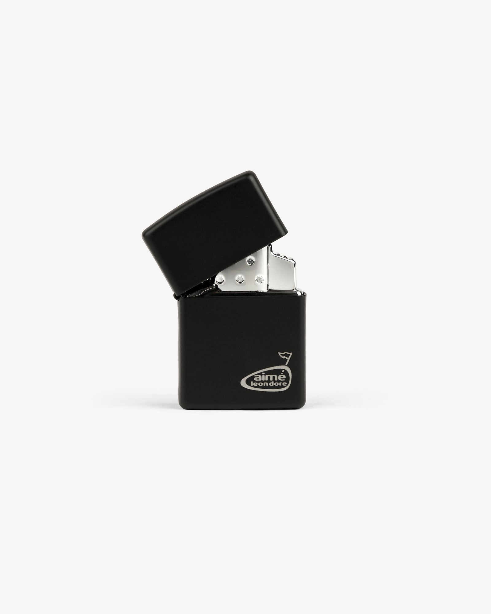 The ALD Golf Cigar Torch Lighter stands upright in black metal, flip-top lid open to reveal its interior.