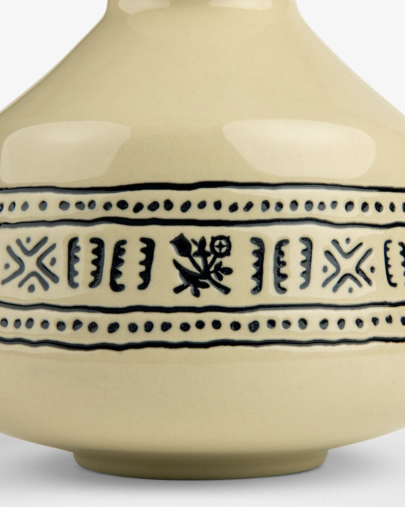 Textile Patterned Bud Vase in beige ceramic with black geometric and floral patterns around the middle.