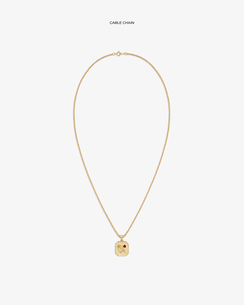 14Kt Gold Queens Crest Relief Pendant on a cable chain, featuring an engraved design and a small red stone detail.