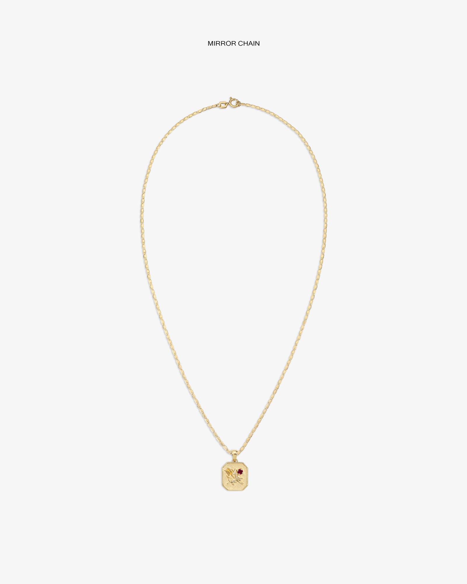 14Kt Gold Queens Crest Relief Pendant with small red gem, shown on a plain white background.
