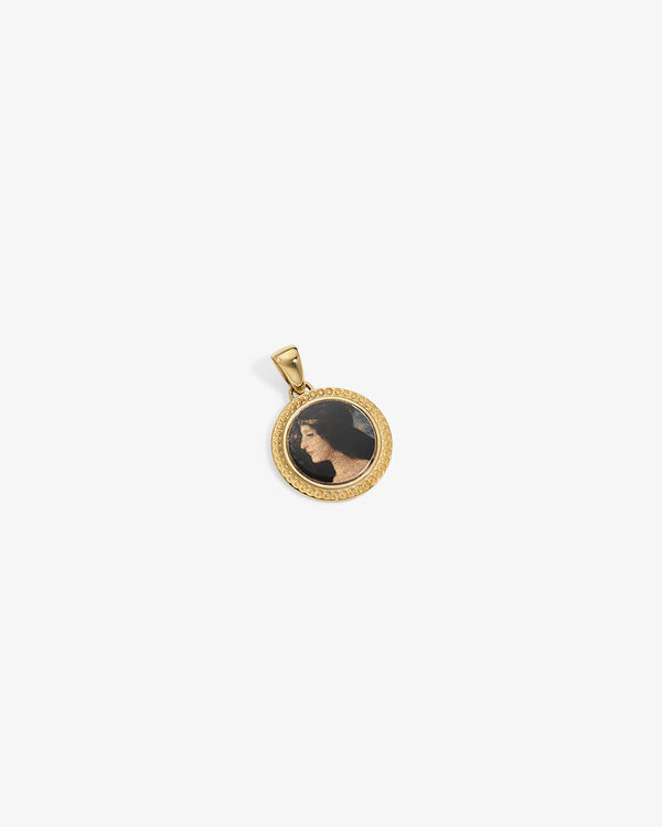 14Kt Gold Hera Pendant with a circular frame featuring a woman's profile on a white background.