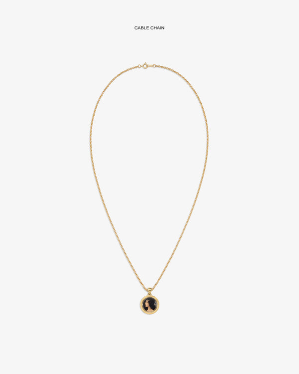 14Kt Gold Hera Pendant: Gold cable chain necklace with round pendant, black design on white background.